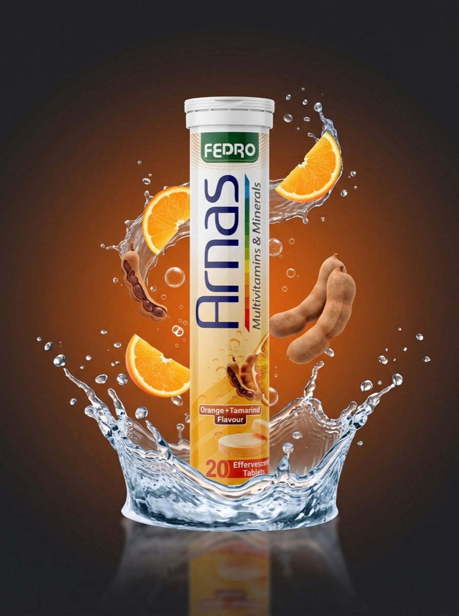 ARNAS Orange and Tamarind effervescent tube in a water splash